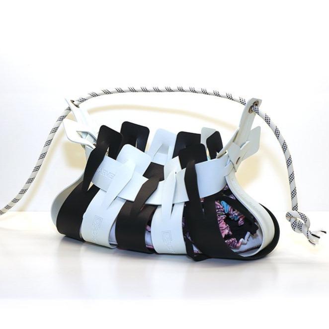 Weaveasy Swing Bag with customizable color straps and adjustable strap, featuring a DiSCARVERY pouch bag.