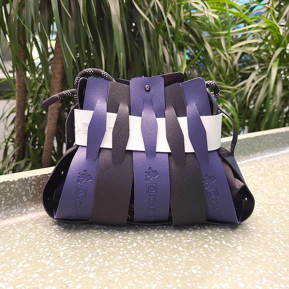 Weaveasy Swing Mini Bag with colorful straps and adjustable design, showcasing the DiSCARVERY pouch bag.