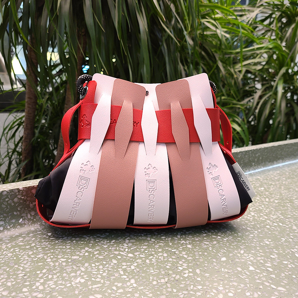 Weaveasy Swing Mini Bag with colorful straps and adjustable design, showcasing the DiSCARVERY pouch bag.