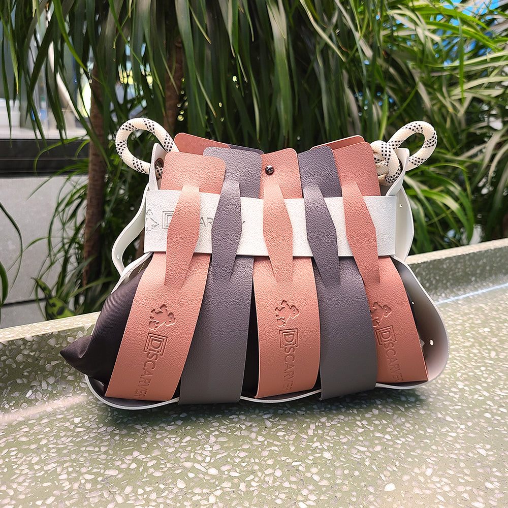 Weaveasy Swing Mini Bag with colorful straps and adjustable design, showcasing the DiSCARVERY pouch bag.