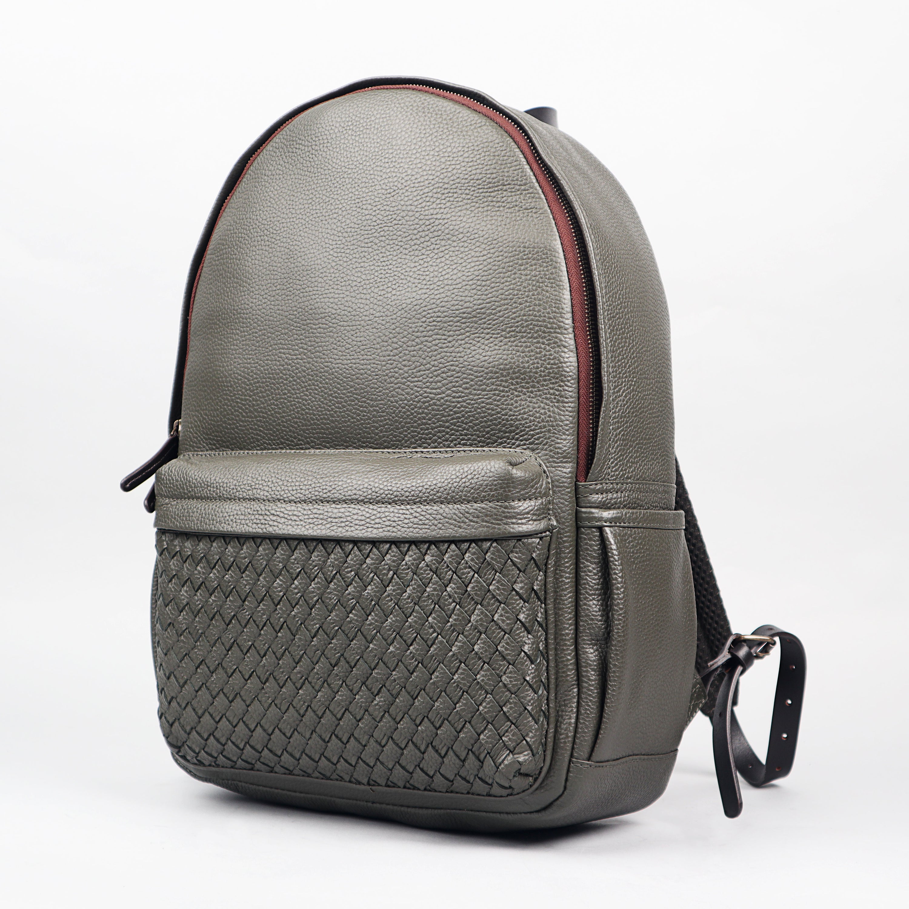 Weaved Journey Leather Backpack showcasing premium full grain leather, multiple pockets, and adjustable straps.