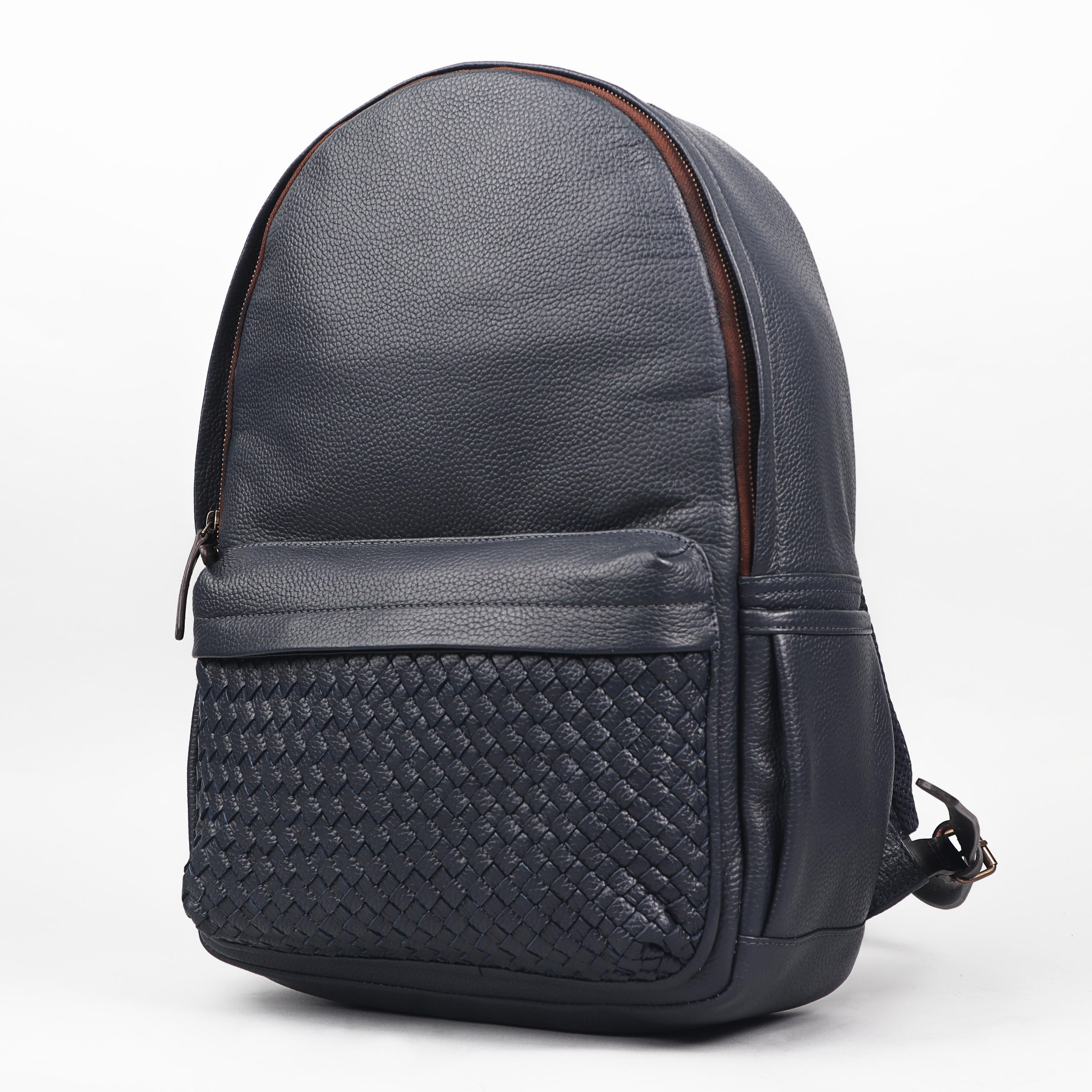 Weaved Journey Leather Backpack showcasing premium full grain leather, multiple pockets, and adjustable straps.