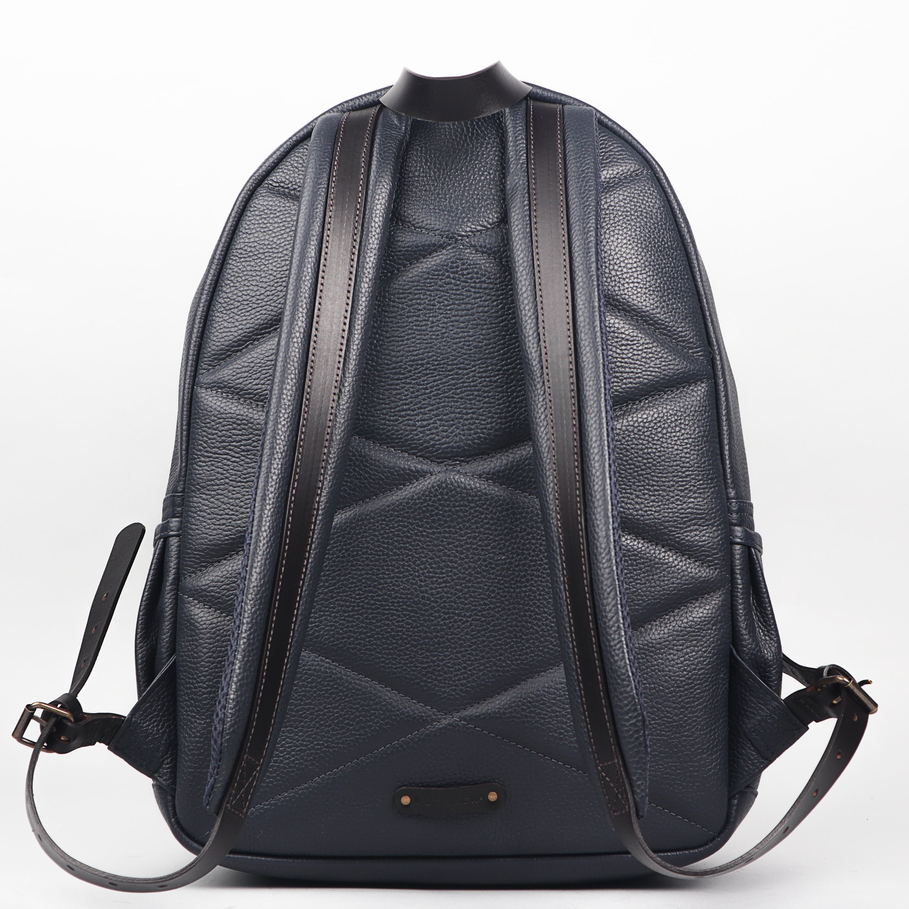 Weaved Journey Leather Backpack showcasing premium full grain leather, multiple pockets, and adjustable straps.