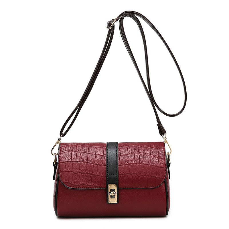 Western Style Fashion Contrast Color Stitching Bucket Bag in wine red, khaki, black, and brown with metal accents and detachable handle.