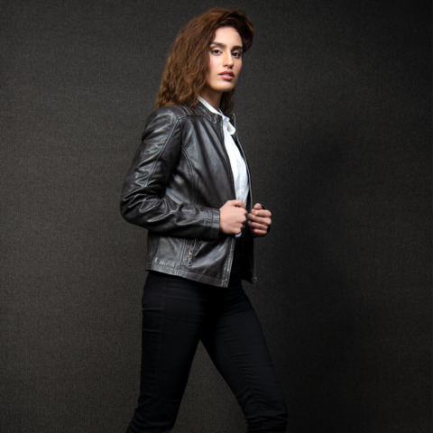 WOMEN PREMIUM MUKMAL Official Leather Jacket showcasing genuine leather, satin lining, and stylish motorcycle design.