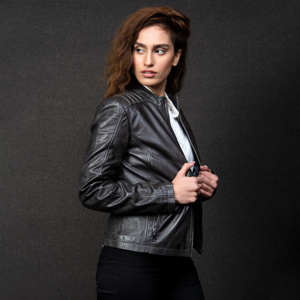 WOMEN PREMIUM MUKMAL Official Leather Jacket showcasing genuine leather, satin lining, and stylish motorcycle design.