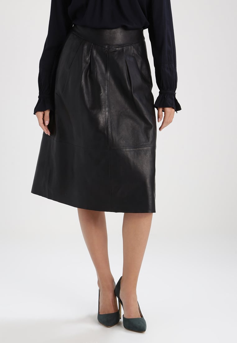 Women Real Lambskin Leather Below Knee Skirt WS119 with satin lining and stylish pockets, showcasing its elegant design.