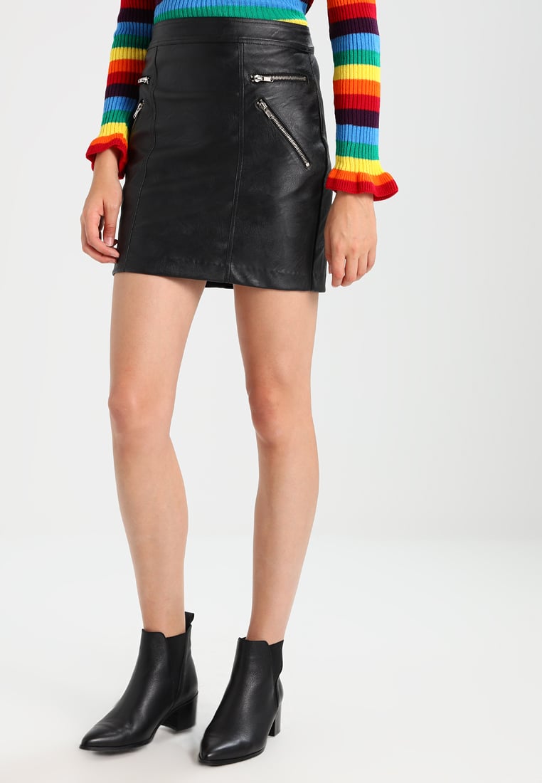 Women Real Lambskin Leather Mini Skirt WS129 featuring high-quality hardware and satin lining, perfect for stylish comfort.