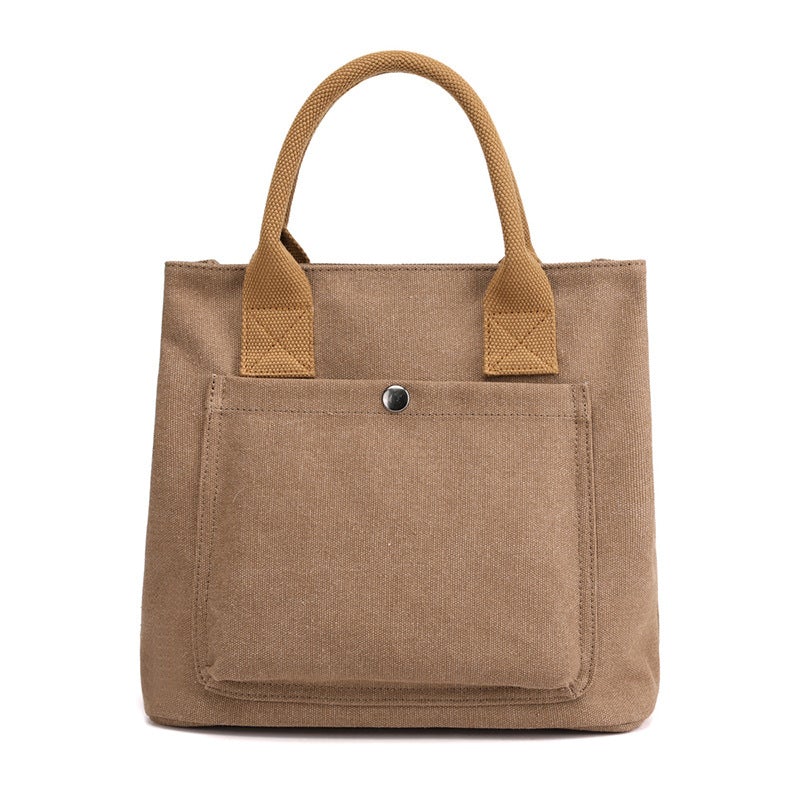 A stylish Women's Casual Canvas Cloth Fashion Handbag in various colors including white, khaki, black, brown, and gray, showcasing its soft surface and compact design.