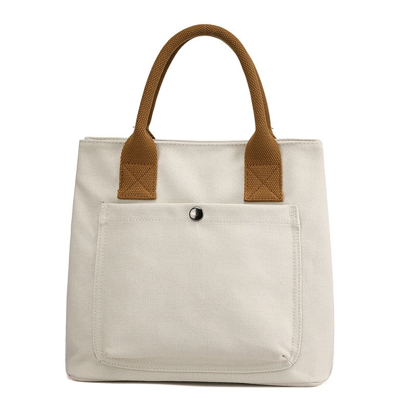 A stylish Women's Casual Canvas Cloth Fashion Handbag in various colors including white, khaki, black, brown, and gray, showcasing its soft surface and compact design.