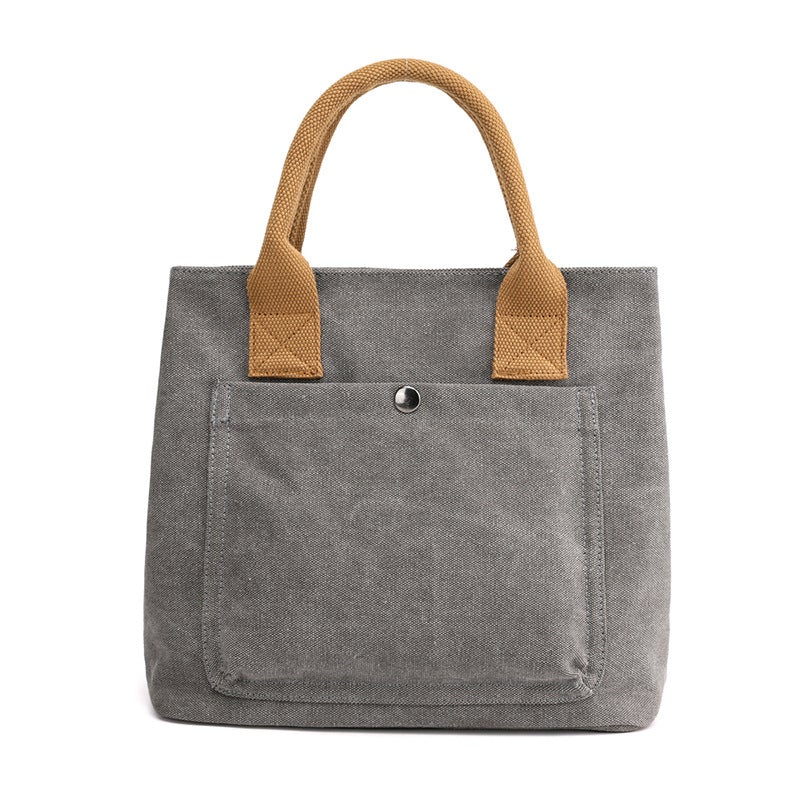 A stylish Women's Casual Canvas Cloth Fashion Handbag in various colors including white, khaki, black, brown, and gray, showcasing its soft surface and compact design.