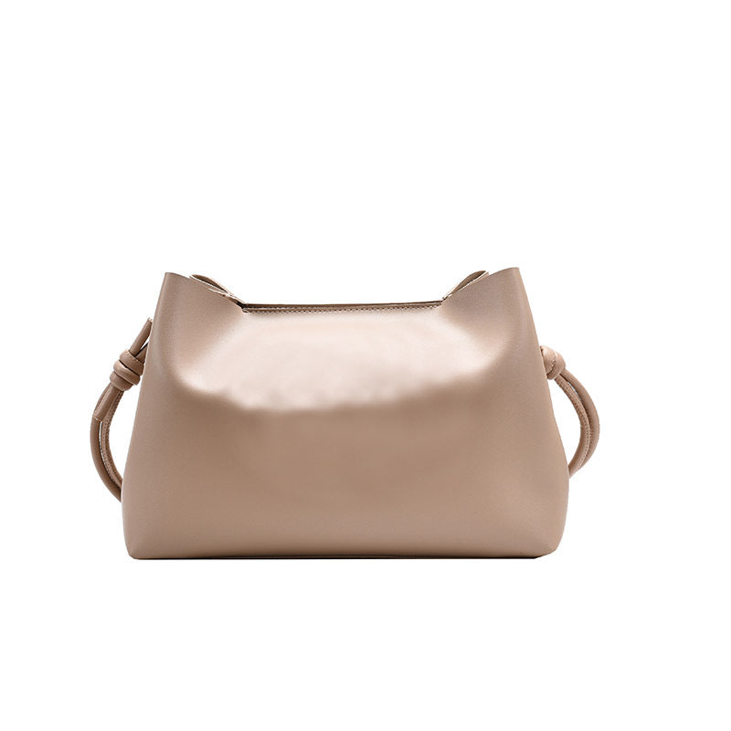 Women's Large Capacity Crossbody Tote Shoulder Bag in khaki, showcasing its spacious bucket design and single shoulder strap.