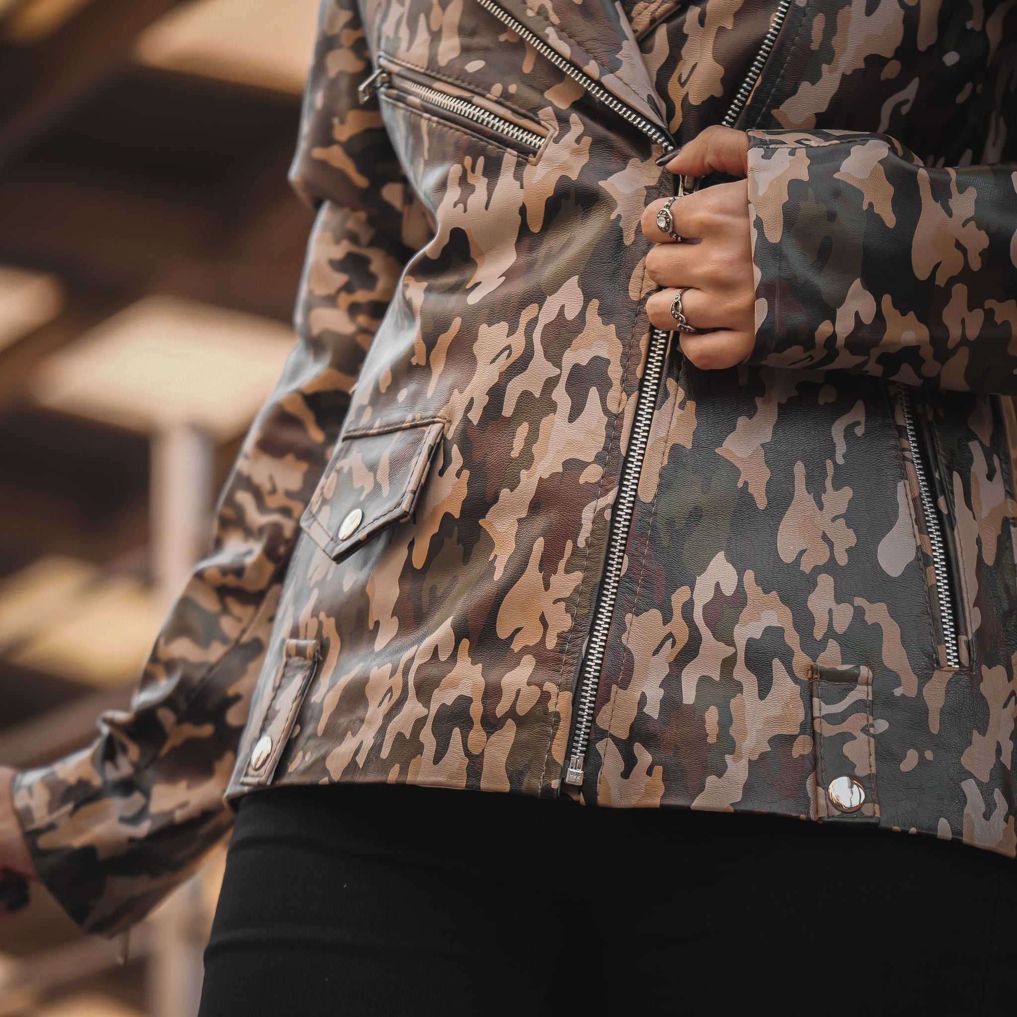 Womens Leather Military Camouflage Print Jacket featuring a stylish camouflage design, lapel collar, and asymmetrical zipper closure.