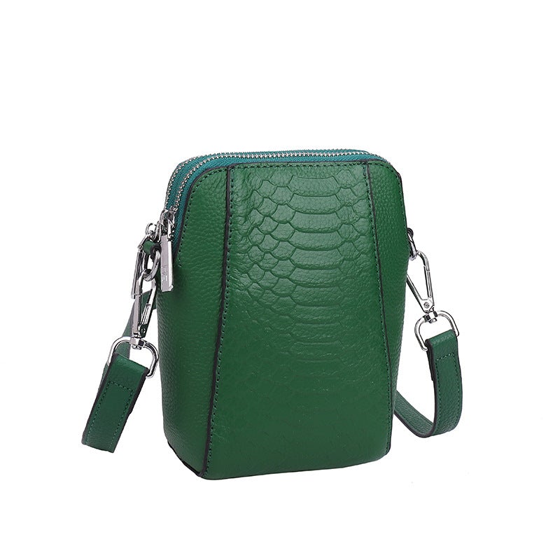 Women's Retro One-shoulder Messenger Small Square Bag in leather with fish scale pattern, showcasing its stylish design and compact size.