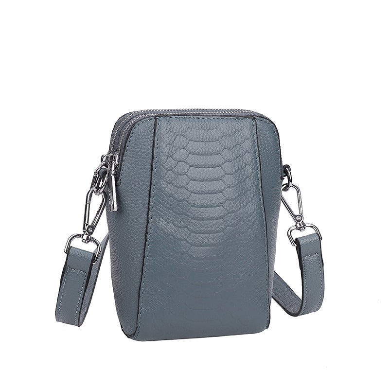 Women's Retro One-shoulder Messenger Small Square Bag in leather with fish scale pattern, showcasing its stylish design and compact size.