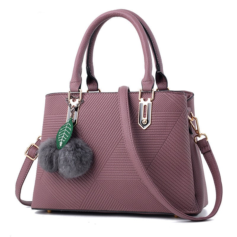 A stylish Women's Small Solid Color Casual Simple Bag made from durable PU material, featuring a minimalist design in a solid color.