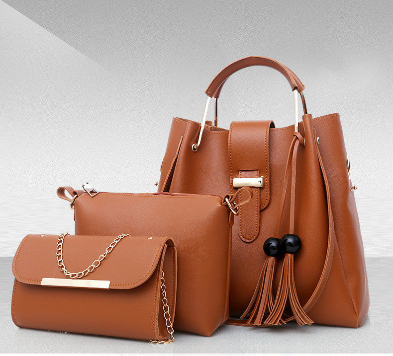 A stylish Women's Three-Piece Handbag set featuring three bags in a horizontal square shape with trendy tassel accents, made from durable PU material.