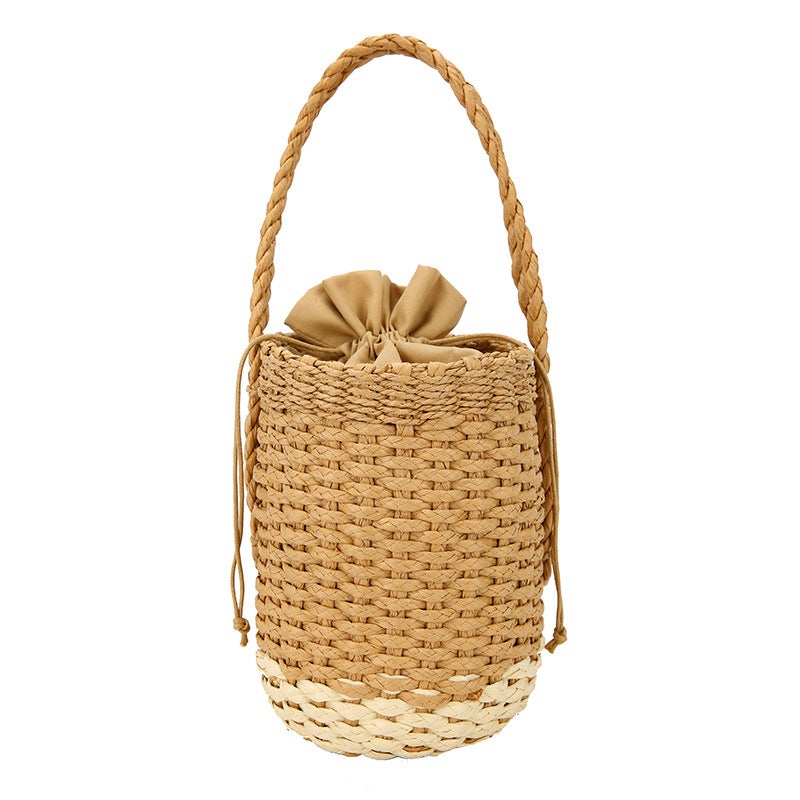 A stylish Young Lady's Leisure Bucket Straw Bag in white and yellow, showcasing its urban simplicity design and single strap.