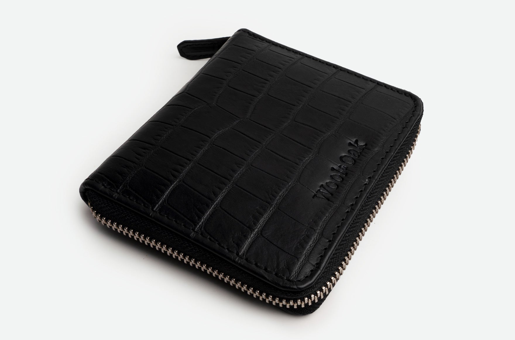 A stylish Zip Around Wallet made of genuine Italian leather, featuring golden YKK zippers and a snapped coin purse.