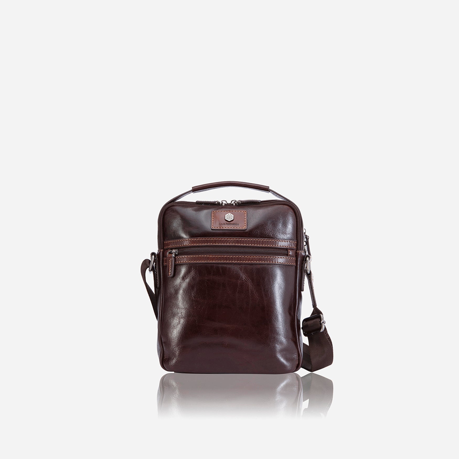 Stylish Zip Crossbody Bag in Tobacco color, featuring ample space and a sleek design, perfect for travel and daily use.