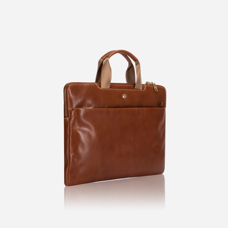 Zulu Laptop Sleeve in tan, featuring a sleek design and shoulder strap loops for easy carrying.