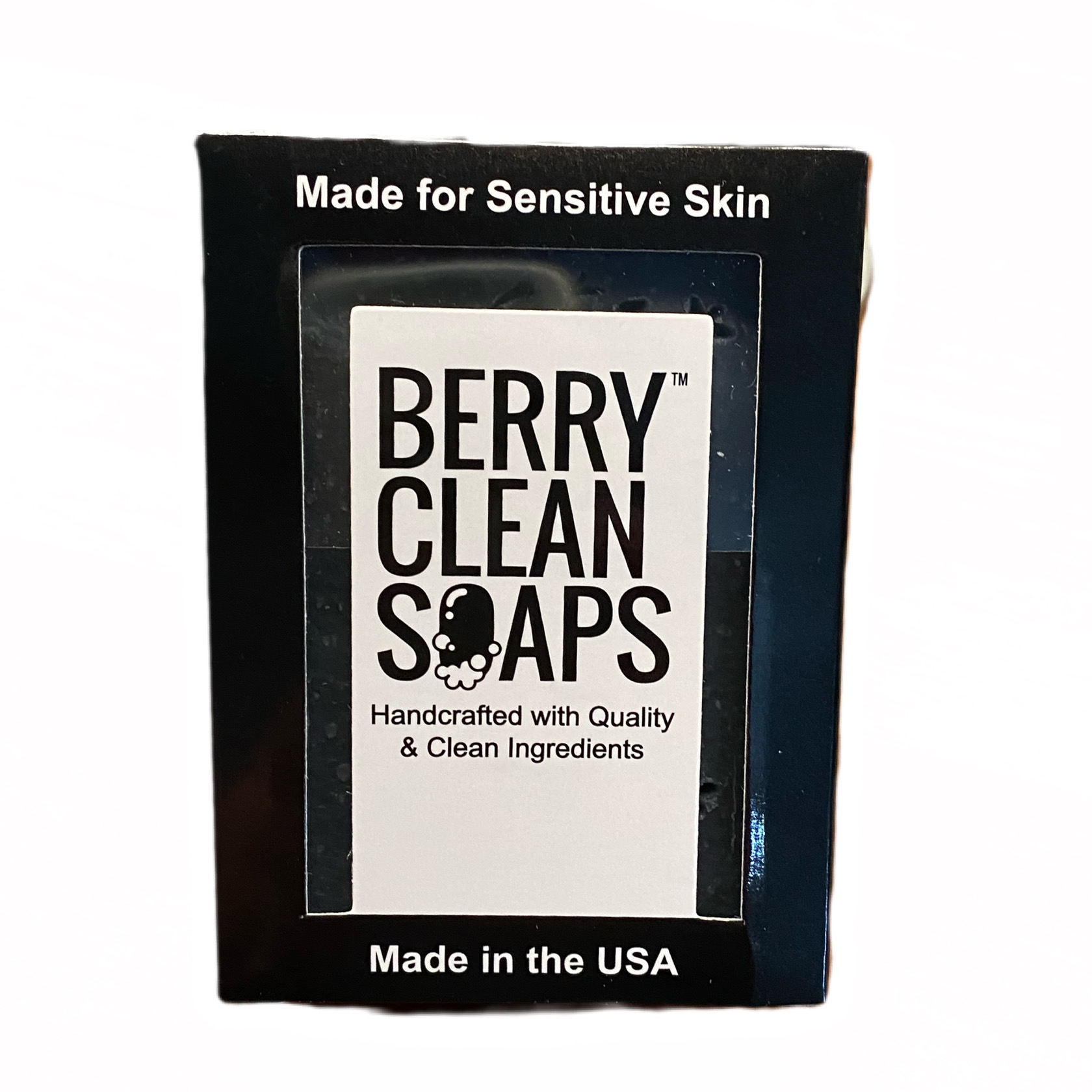 Activated Charcoal Aloe Soap bar with creamy lather, showcasing its natural ingredients and rich texture.