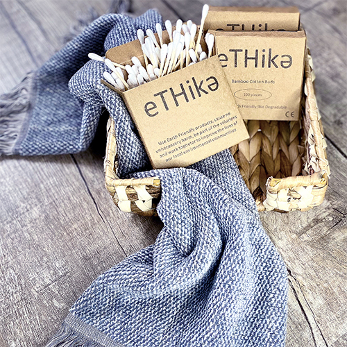 Set of 2 packs of eco-friendly bamboo cotton buds with cotton tips, packaged in a recycled paper box.