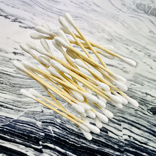 Set of 2 packs of eco-friendly bamboo cotton buds with cotton tips, packaged in a recycled paper box.