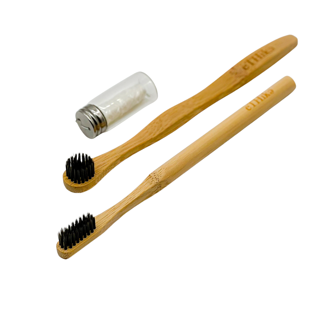 Bamboo Oral Hygiene Care Set including a toothbrush, tongue brush, and mint dental floss in a glass jar, showcasing eco-friendly dental care products.