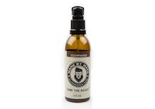 A bottle of Cedar Wood Beard Oil, showcasing its natural ingredients and elegant packaging, perfect for beard care.