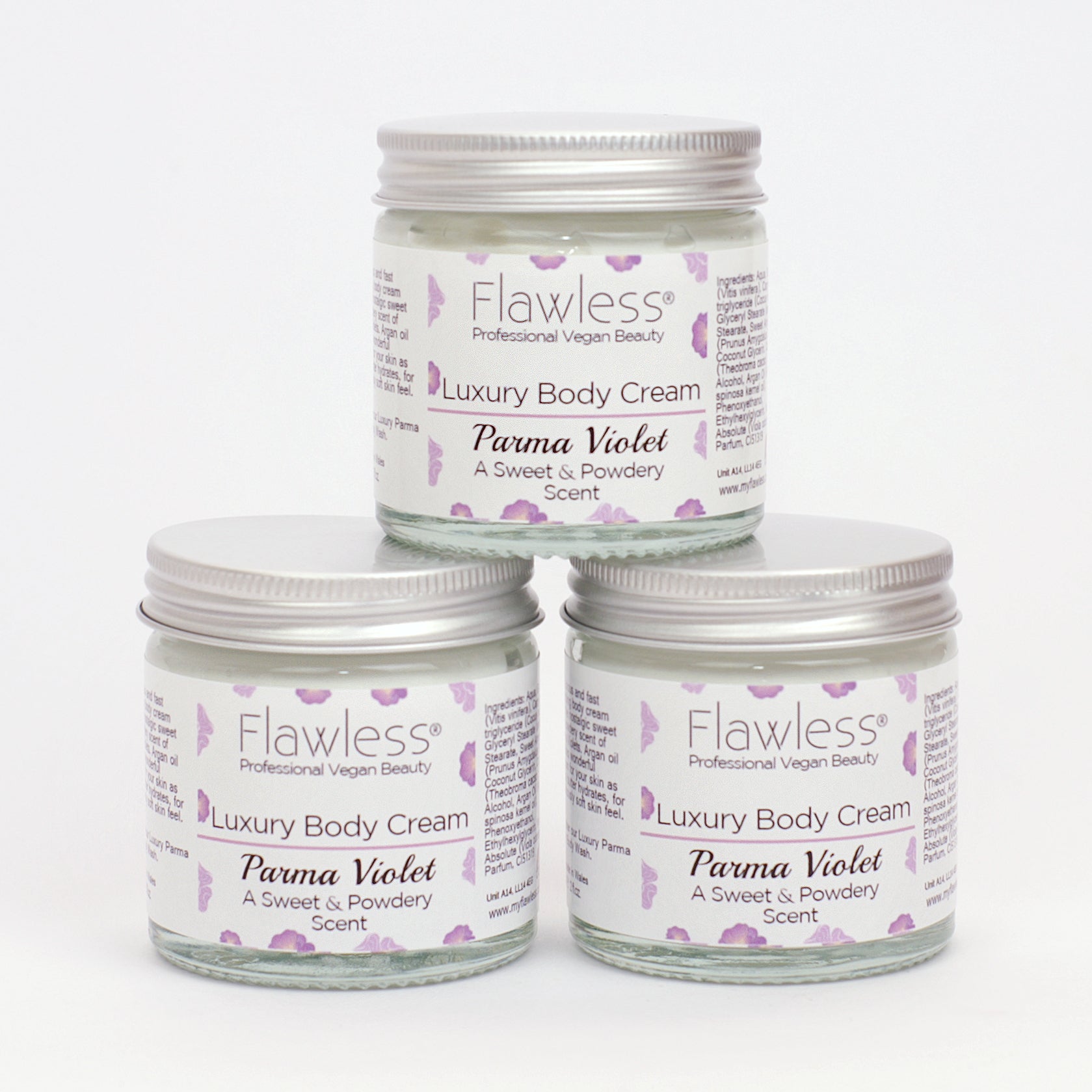 A luxurious jar of Parma Violet Body Cream with a delicate floral design, showcasing its eco-friendly packaging.