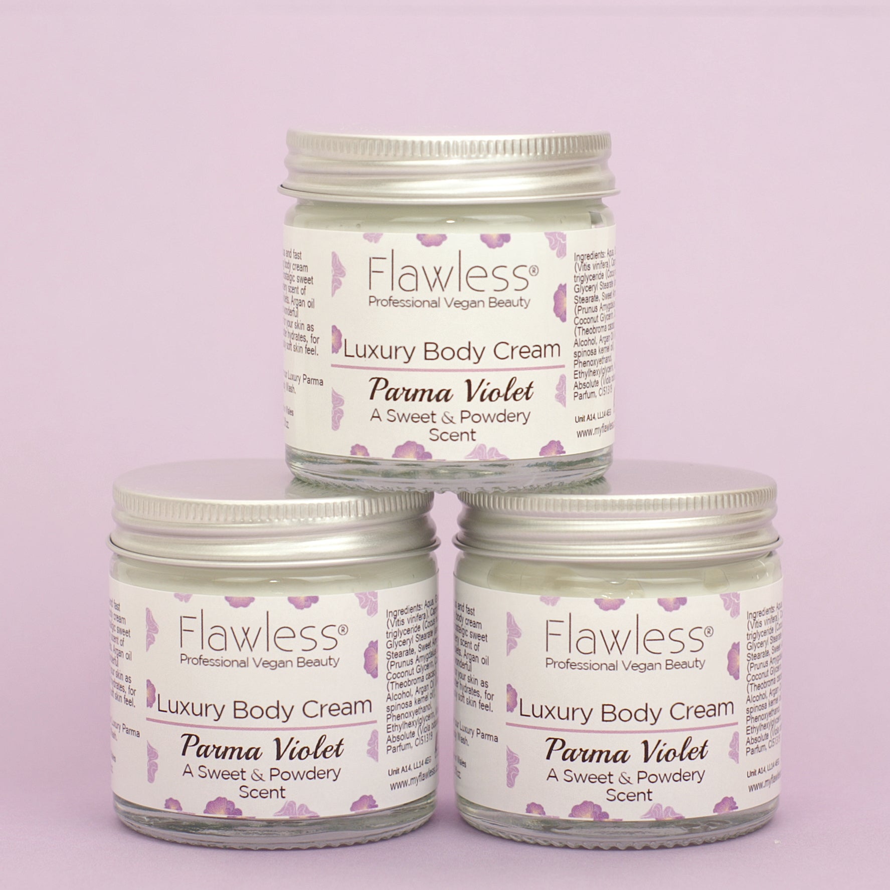 A luxurious jar of Parma Violet Body Cream with a delicate floral design, showcasing its eco-friendly packaging.