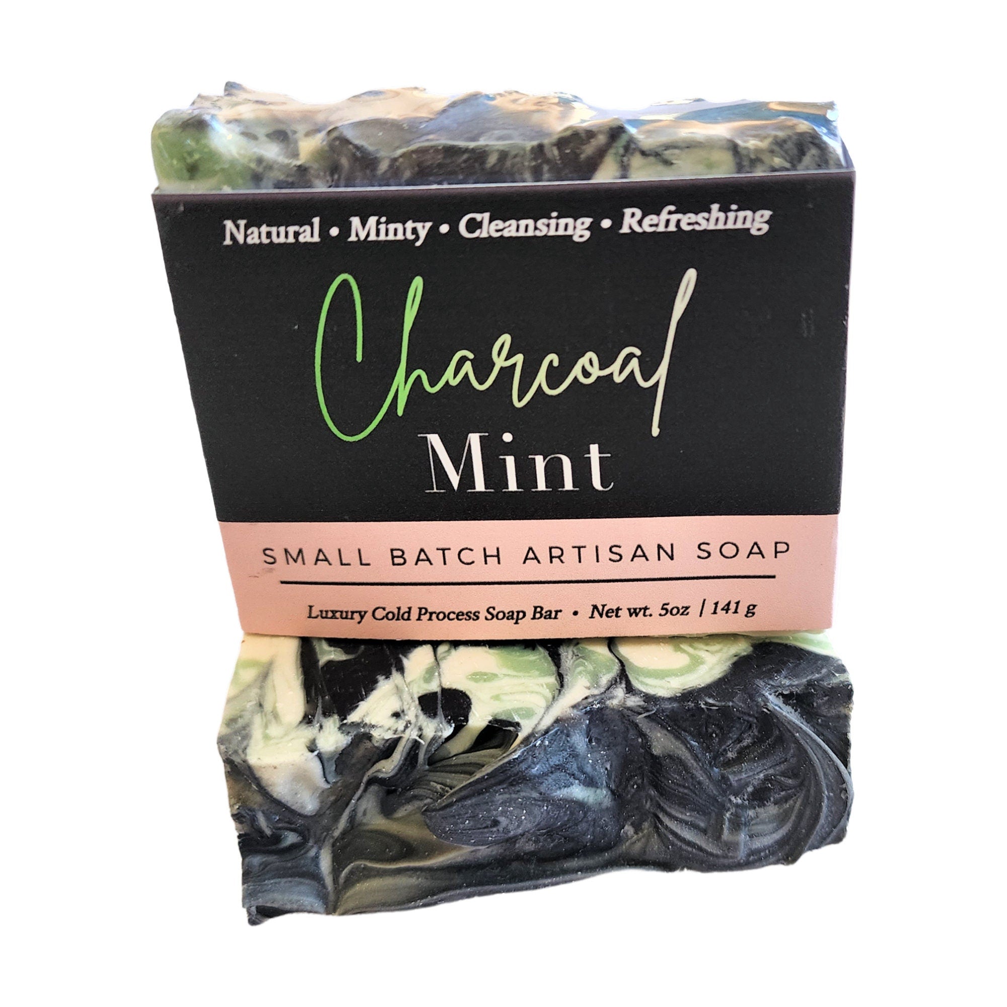 Charcoal Mint Soap with seafoam green and white sand swirls, showcasing its unique design and texture.