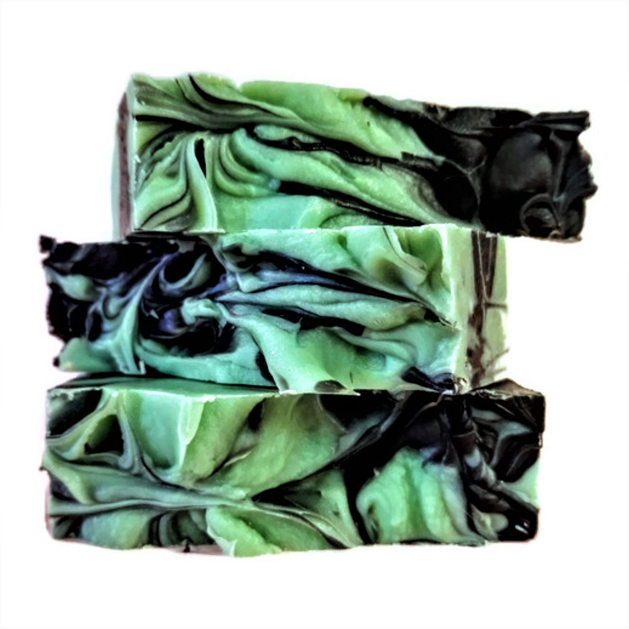 Charcoal Mint Soap with seafoam green and white sand swirls, showcasing its unique design and texture.