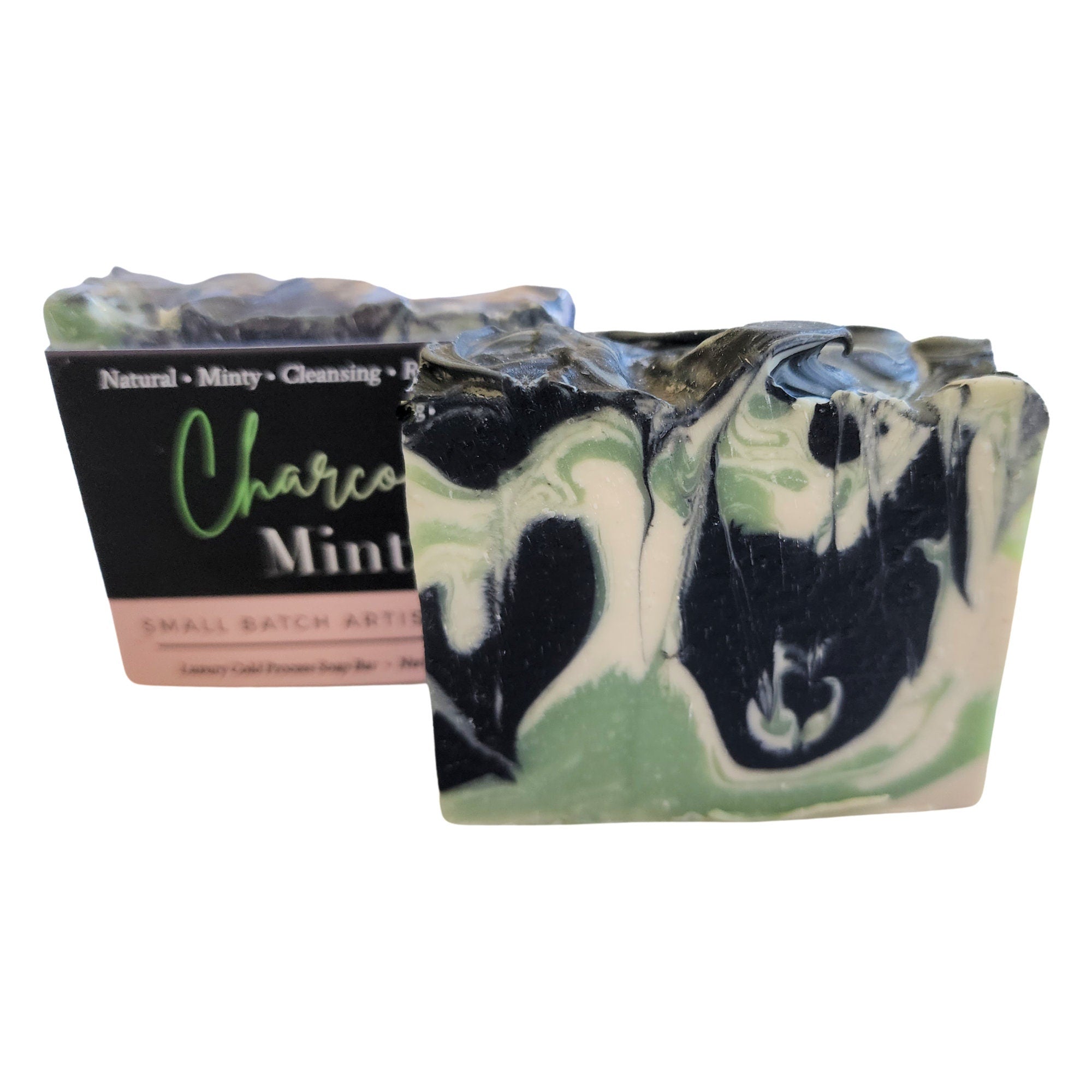 Charcoal Mint Soap with seafoam green and white sand swirls, showcasing its unique design and texture.