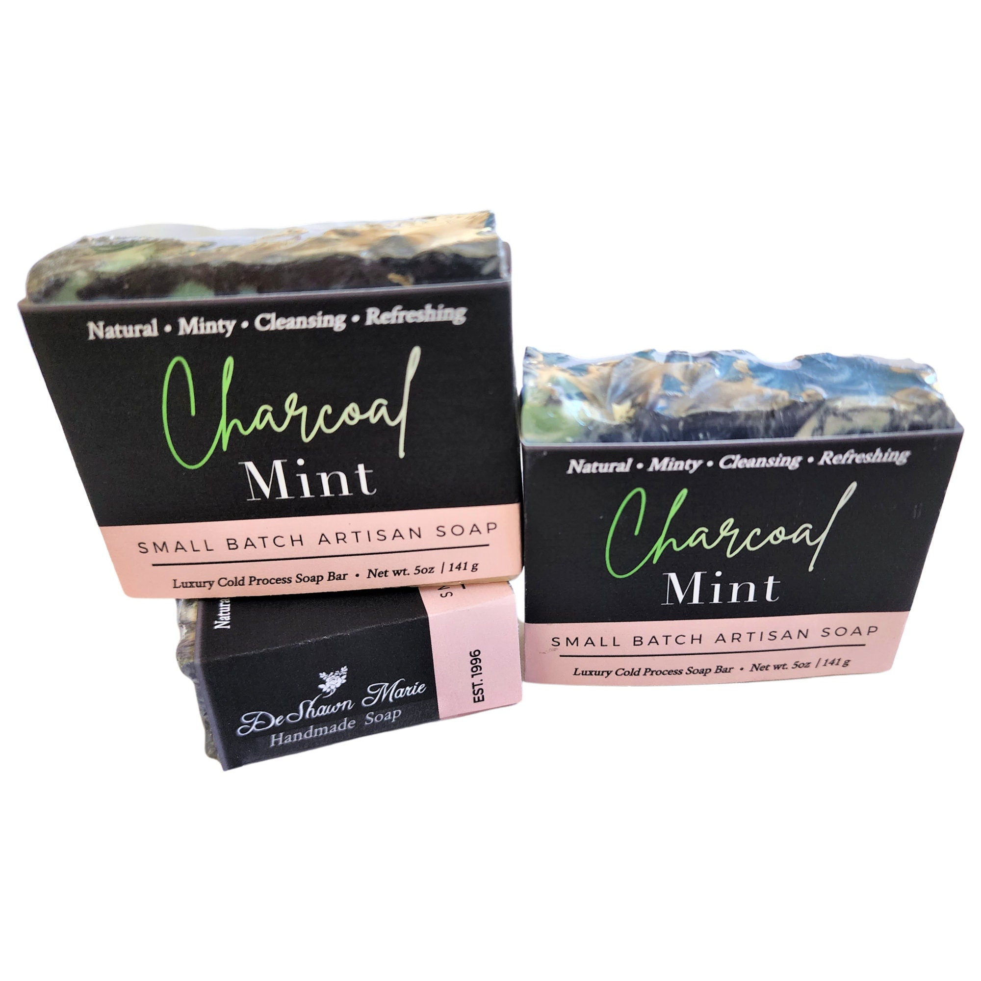 Charcoal Mint Soap with seafoam green and white sand swirls, showcasing its unique design and texture.