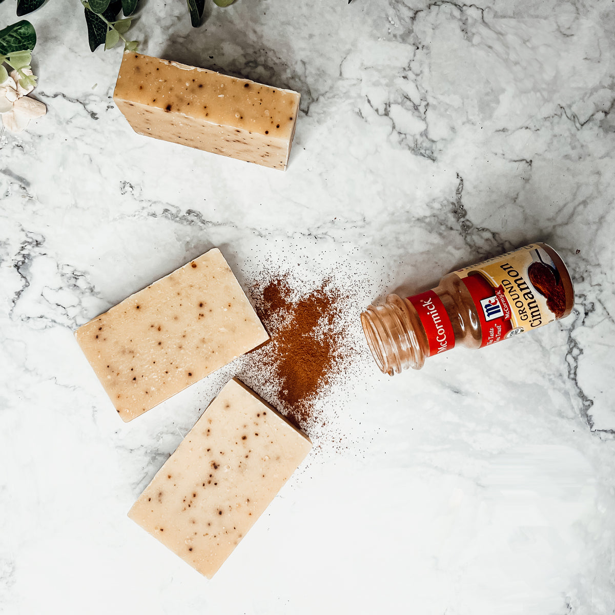 Cinnamon Latte soap bars with a strong cinnamon scent and coffee grounds, handcrafted in small batches.