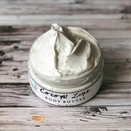 A 4 oz jar of Coconut Lime Body Butter, showcasing its creamy texture and tropical scent.