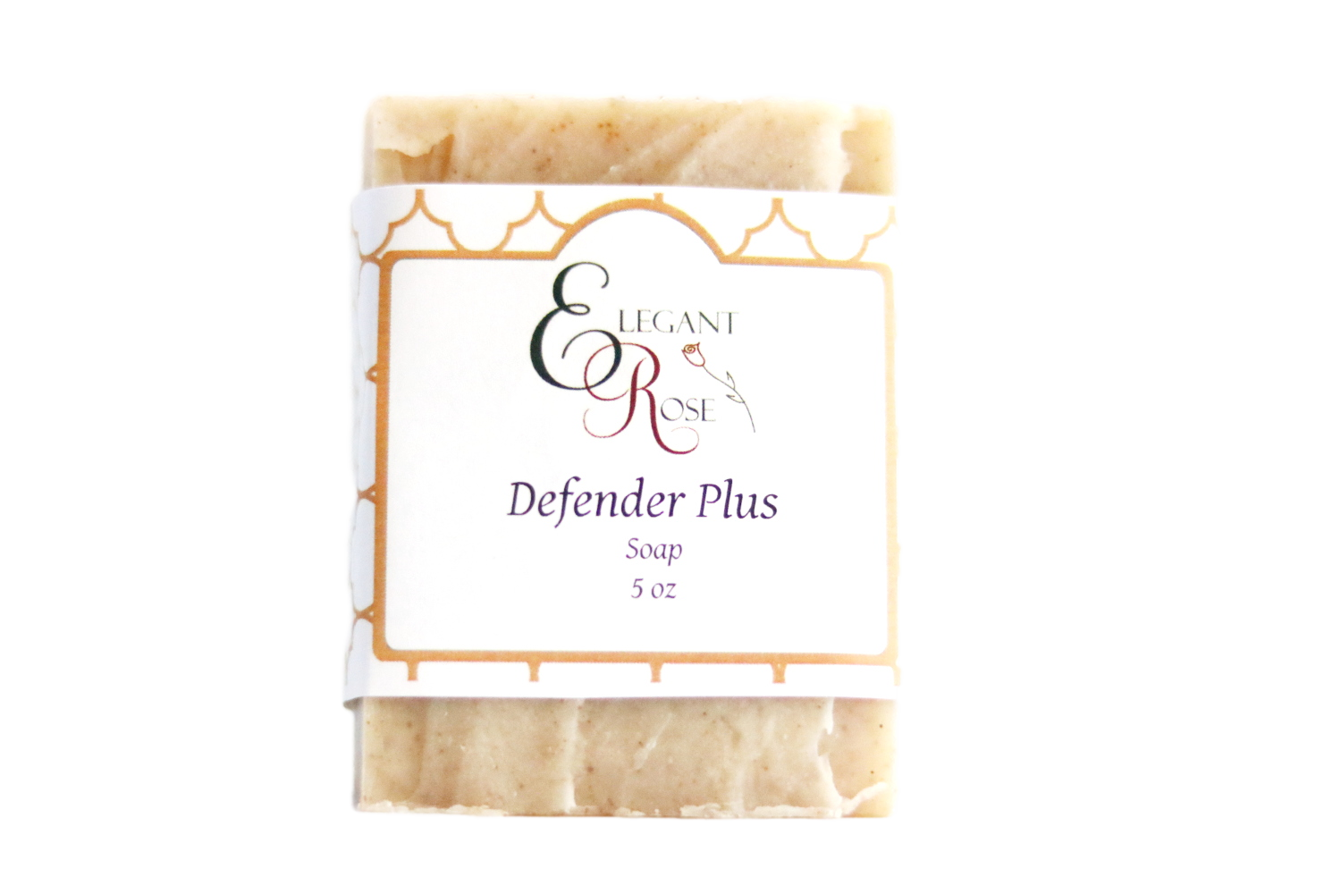 Defender PLUS Soap bar with natural ingredients, featuring essential oils and powders of frankincense and myrrh, displayed on a rustic wooden background.