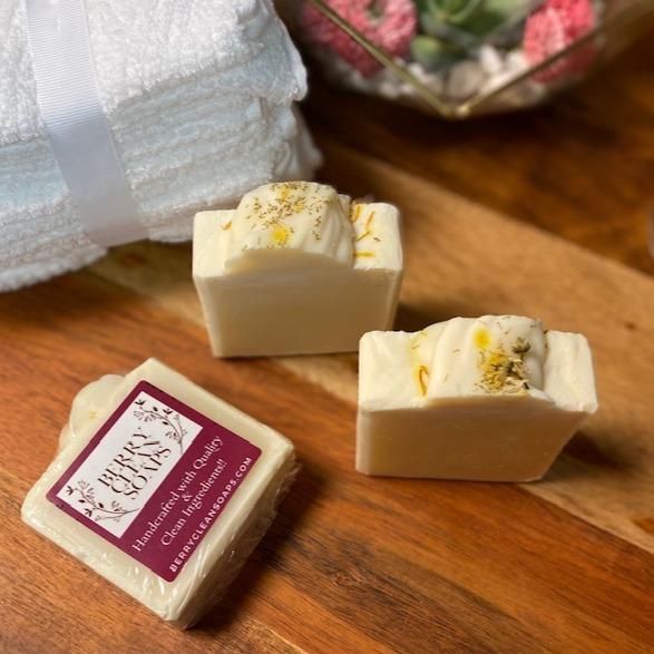 Eczema Chamomile & Calendula Soap bar with natural ingredients, showcasing its creamy texture and soothing properties for sensitive skin.