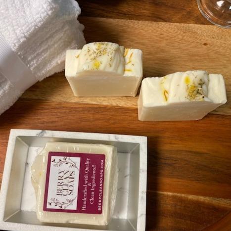 Eczema Chamomile & Calendula Soap bar with natural ingredients, showcasing its creamy texture and soothing properties for sensitive skin.