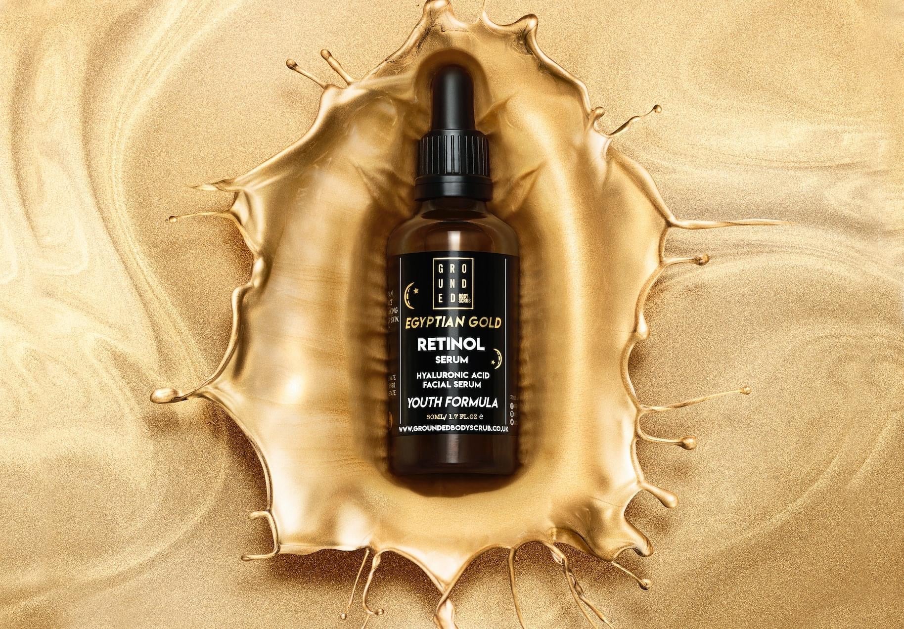 Egyptian Gold Retinol Face Serum in a sleek 50ml bottle, showcasing its luxurious design and golden hue.