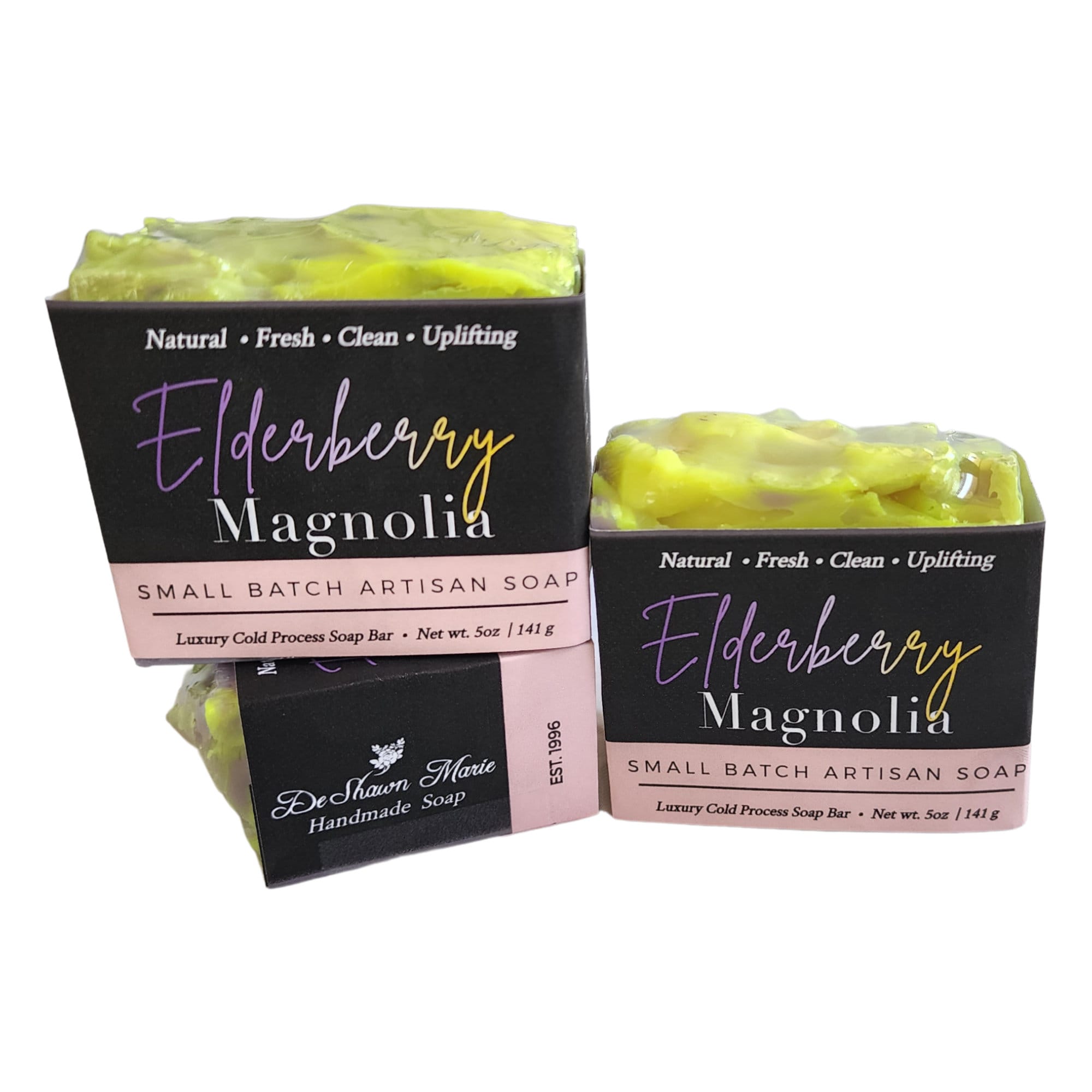 Elderberry Magnolia Soap bar with vibrant berry and floral design, showcasing its handcrafted quality.