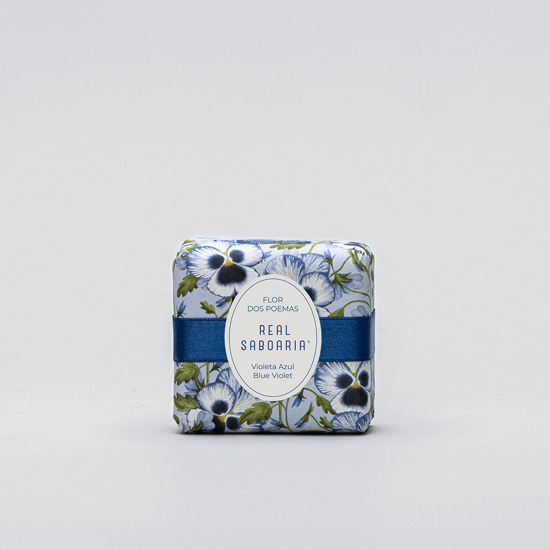 Flower of Poems Soap bar with floral design, enriched with olive oil, showcasing its vegan and eco-friendly attributes.