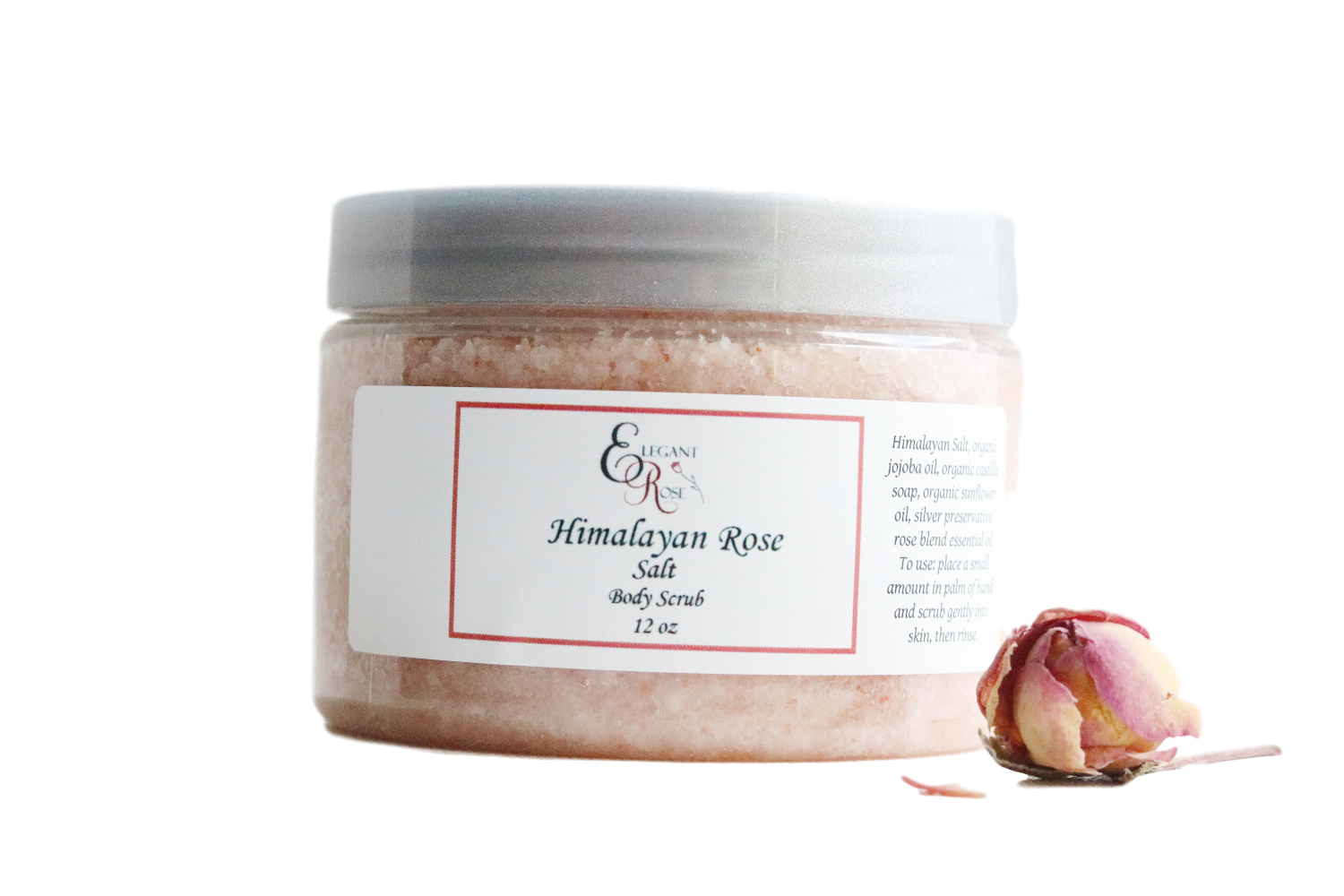 A jar of Himalayan Rose Salt Body Scrub with a pink hue, surrounded by Himalayan salt crystals and fresh grapefruit slices, showcasing its natural ingredients.