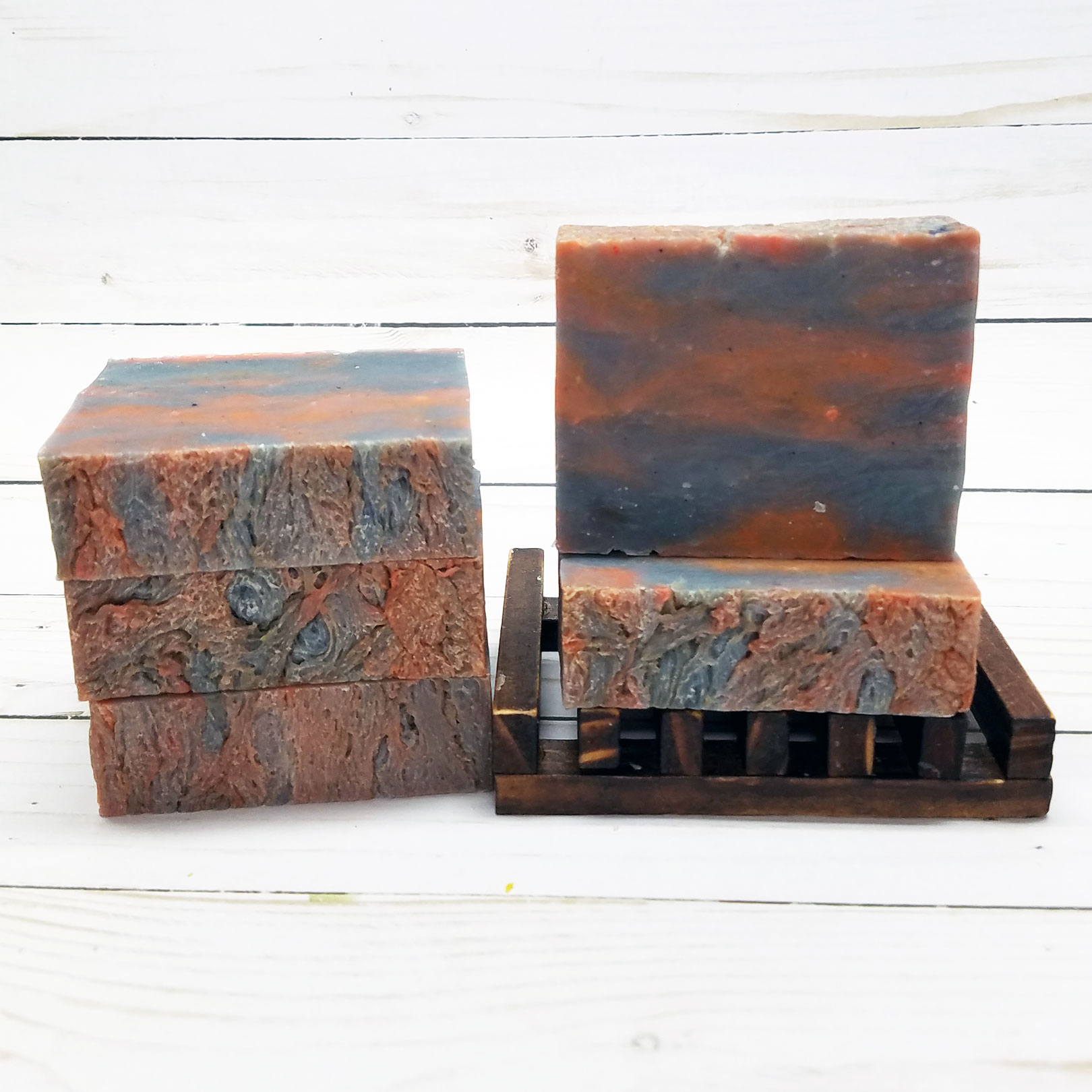 Lakeside Fire Handmade Soap with floral and fruity scents, showcasing its natural ingredients and vibrant colors.