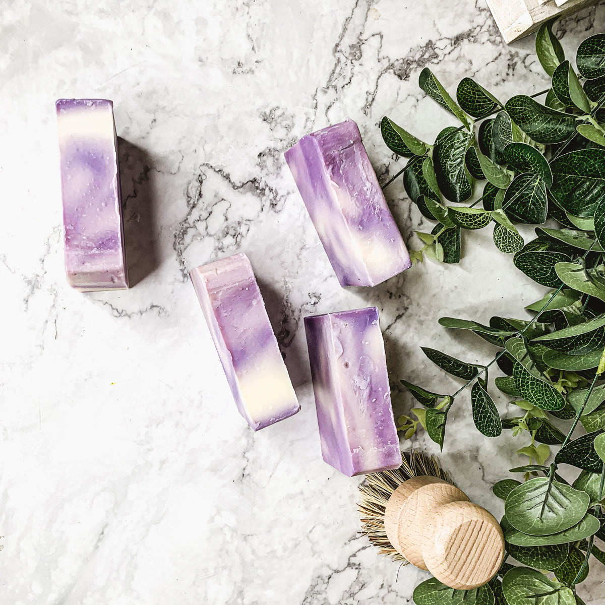 Lavender Lemongrass soap bar with vibrant colors and natural ingredients, showcasing its handcrafted quality.