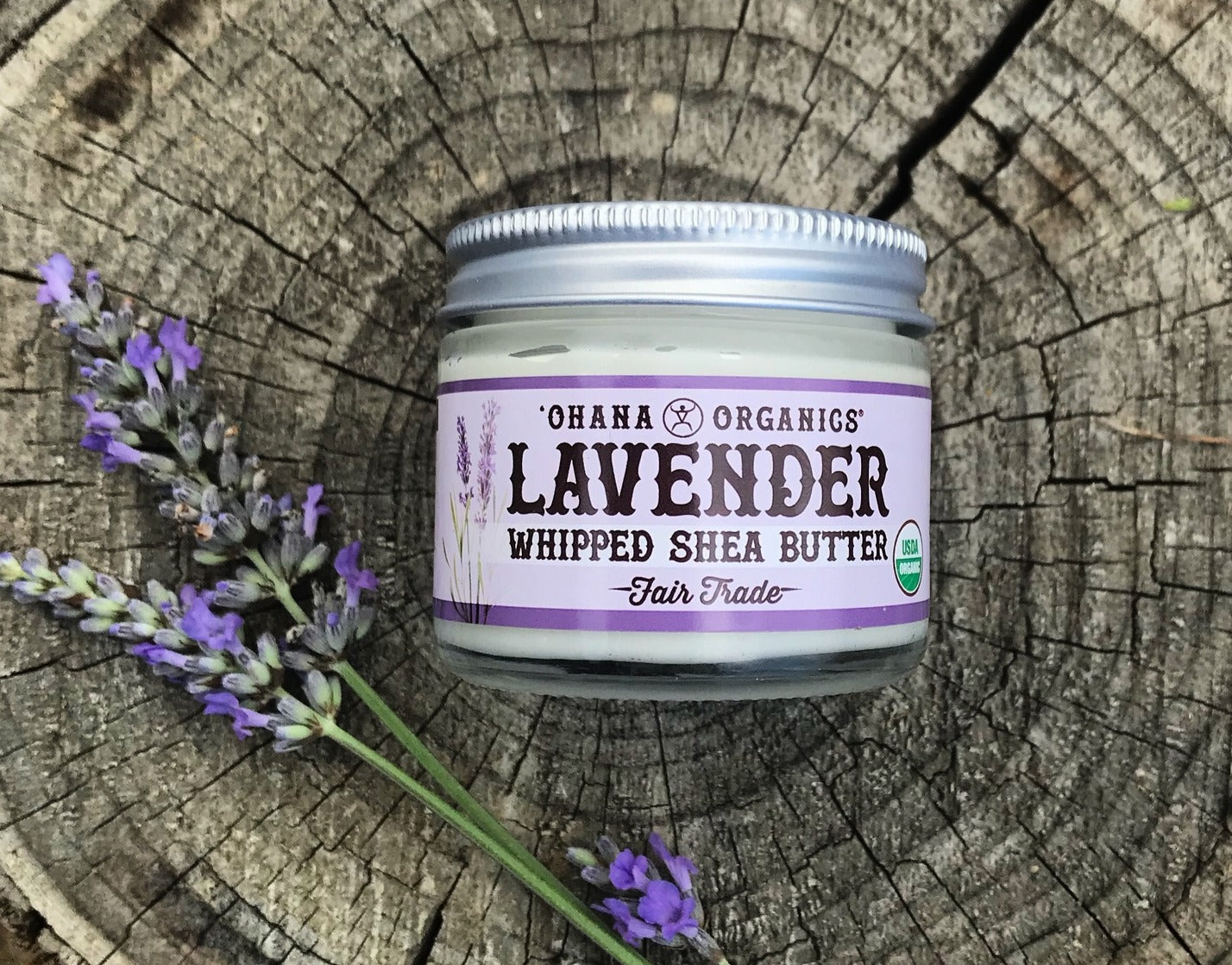 A 2oz recyclable glass jar of Lavender Whipped Shea Butter, showcasing its creamy texture and lavender color.