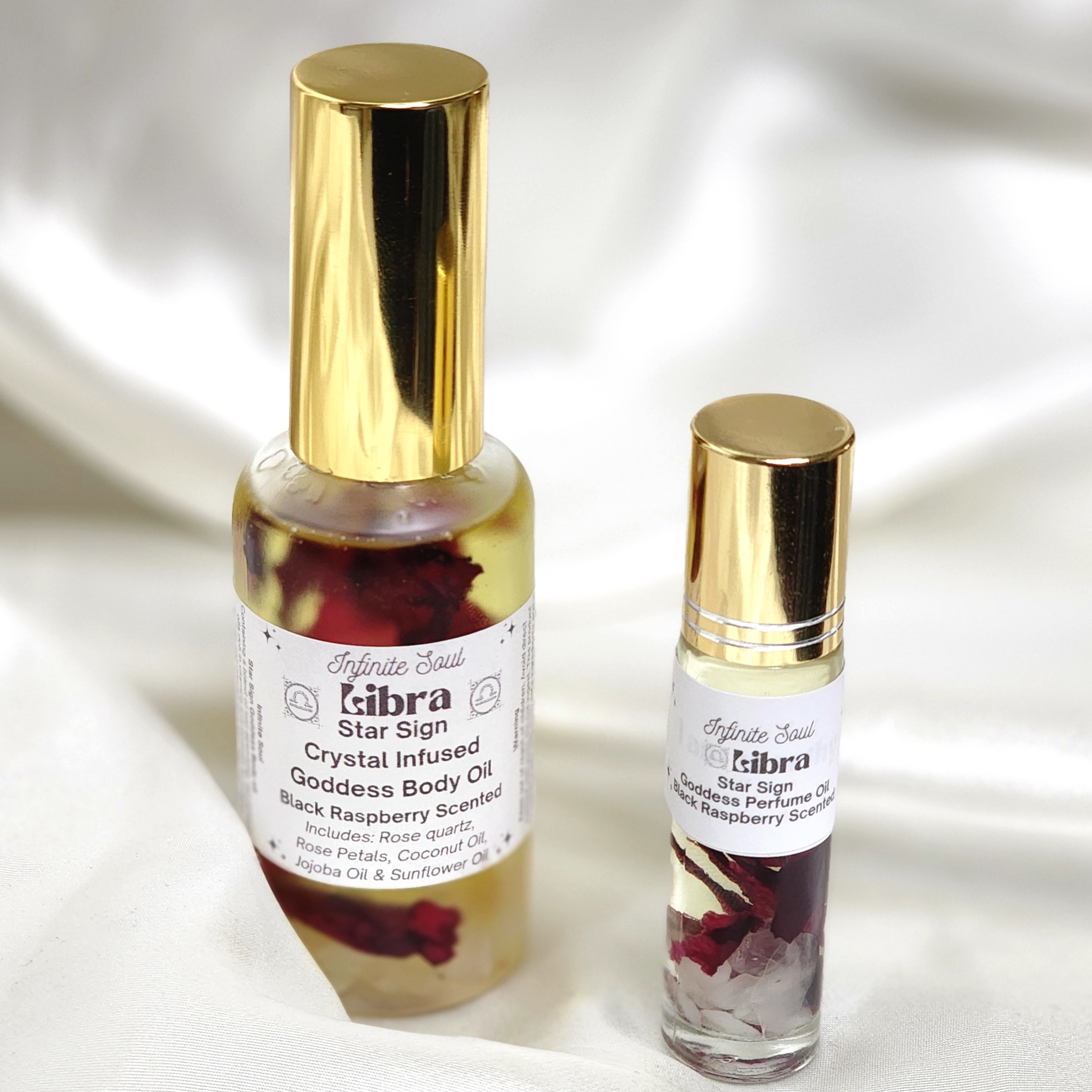 Libra Star Sign Crystal Infused Goddess Body and Perfume Oil in a sleek bottle, featuring Rose Quartz crystal chips and a black raspberry scent.