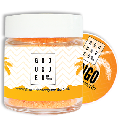 Grounded Mango Lip Scrub in a 30g jar, featuring a vibrant tropical design and showcasing its natural ingredients.